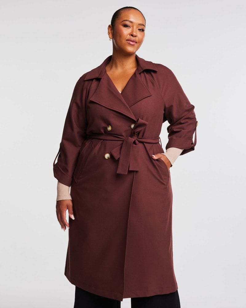 Front of a model wearing a size 20W Noella Trench in Chocolate by Estelle. | dia_product_style_image_id:315656